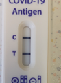 Nadal-Test: Geruchs-Geschmackssinn gestört. ct Wert aus PCR ca. 28, Anmerkung: Der Teststrich ist ungewöhnlich deutlich für einen so hohen PCR Wert, idR Werden so hohe Werte per Antigentest kaum mehr detektiert. Eventuell ist der gemessene ct Wert zu hoch, z.B. wegen Abstrich an ungünstiger Stelle.